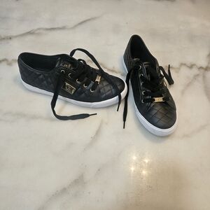 Black Quilted Sneakers with Gold Accents